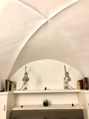 two lights on a shelf in a room at Navona Luxury Suite Apartment by NDP rent in Rome