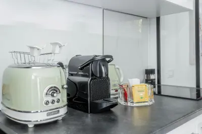 a coffee maker sitting on a counter in a kitchen at MauveSweetRhome 1 in Rome