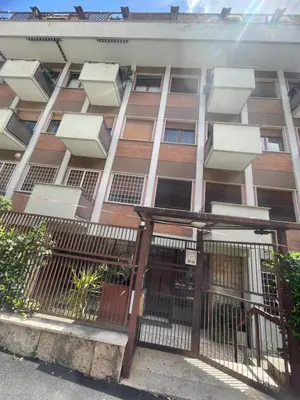 a building with a gate in front of it at Carpegna Vatican House in Rome