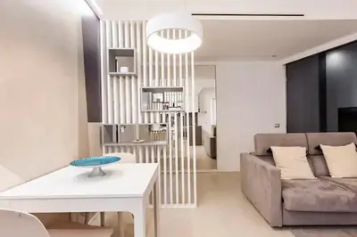 a living room with a couch and a table at Vatican Flat in Rome