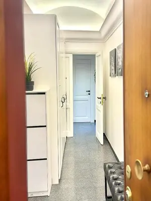 a hallway with a door leading into a room at Rinascita Vatican Home in Rome