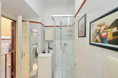 a bathroom with a shower and a toilet at Cappellari37 in Rome
