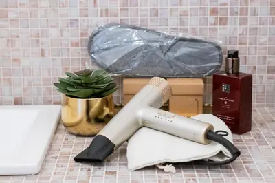 a hair dryer sitting on top of a counter at LV Vatican boutique apartment in Rome