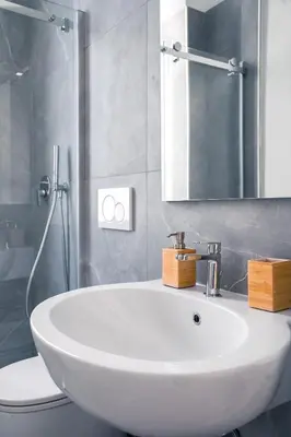 a bathroom with a white sink and a toilet at VILLA LINA - sky earth liberty villa - 5 min from tube in Rome