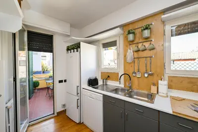 a kitchen with a sink and a counter at Navona design rooftop in Rome