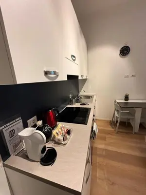 a kitchen with a sink and a counter top at Liberty Home in Rome