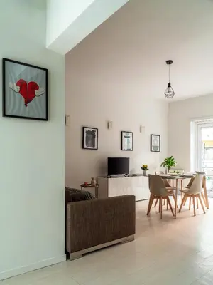 a living room with a couch and a table at alPigneto Apartment Rome in Rome