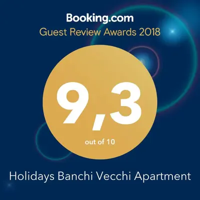 a greetings card for the guest review awards with a yellow circle with at Holidays Banchi Vecchi Apartment in Rome