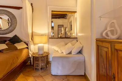 a living room with a couch and a table at Navona Historic Lovely Flat in Rome