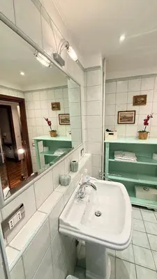 a bathroom with a sink and a mirror at Casa Lory in Rome