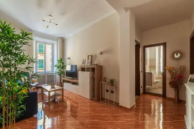 a living room with a couch and a table at CS Beautiful San Giovanni Apt in Rome