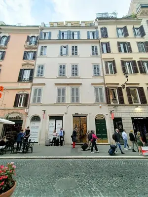 a group of people walking in front of a building at Casa Lucrezia in Rome