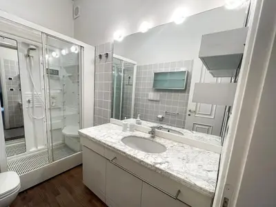 a bathroom with a sink and a shower and a toilet at DeLUX Apartment in Rome