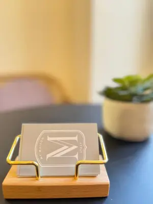 a small box on a table with a plant at My Maison Italy GuestHouse in Rome