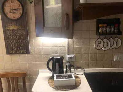 a coffee maker on a counter in a kitchen at Roux apartment in Rome