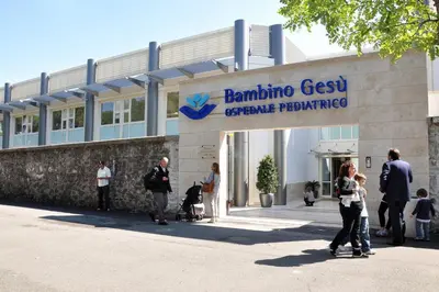 a group of people standing outside of a building at Simon's House in Rome