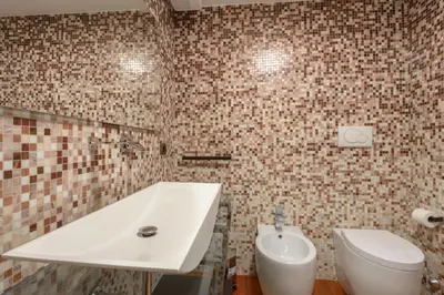 a bathroom with a tub and a toilet and a sink at Rome Guest House Saint Peter in Rome