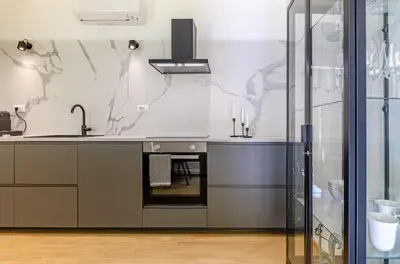 a kitchen with a sink and a stove at Domus Beato Angelico in Rome