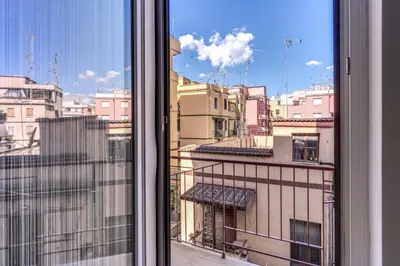 a view of a city from a window at Appartamento Roma metro C Greghouse Centocelle in Rome