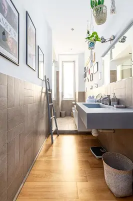 a bathroom with a sink and a mirror at Beautiful Apartment Rome Vaticano in Rome