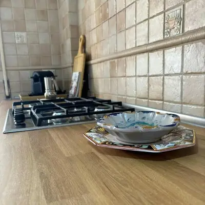 a tray with two bowls on a counter next to a stove at PR - appartamento in centro a Roma in Rome