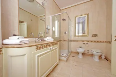 a bathroom with a sink and a shower and a toilet at YCH-Magnifica residenza a Campo de Fiori in Rome