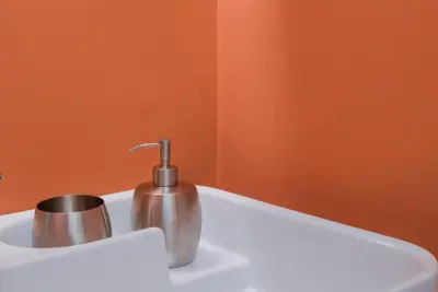 a bathroom sink with a silver faucet on it at Palazzo Piazza Cavour-ZEN62 in Rome