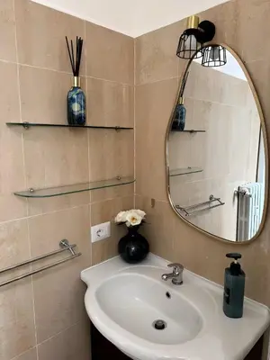 a bathroom with a sink and a mirror at Vatican Roof Luxury Tiffany terrasse privée in Rome