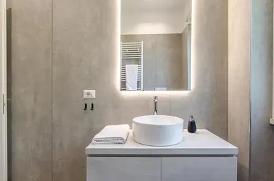 a bathroom with a sink and a mirror at Domus Campi Flegrei in Rome
