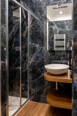 a bathroom with a sink and a shower at Appartamento con 2 camere e 2 bagni -San Giovanni- in Rome