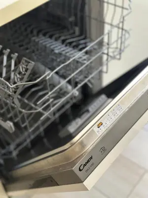 a dishwasher with a dish rack inside of it at Olimpia Bis - Gianicolo - Trastevere - Vaticano - Centro Storico di Roma in Rome