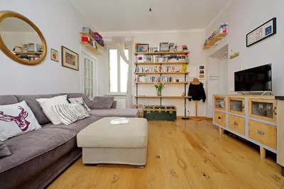 a living room with a couch and a table at Cozy Esquilino - My Extra Home in Rome