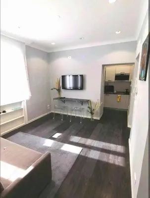 a living room with a couch and a table at Piazza di Spagna Suite in Rome