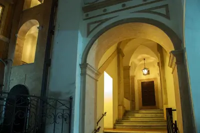 an alleyway with a staircase in a building at Palazzo De Cupis - Suites and View in Rome