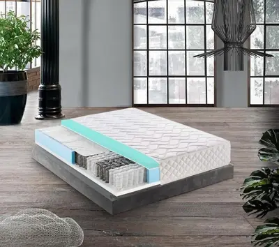 a bed is sitting on the floor in a room at Vatican House intero appartamento in Rome
