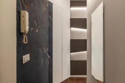 a hallway with a phone on a wall at GuestHost - Monteverde Classy Apartment in Rome