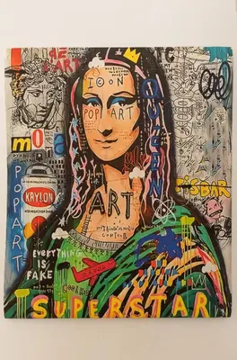 a painting of a woman on a wall with graffiti at Casa ZOE in Rome