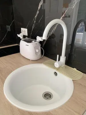 a bathroom sink with a toaster and a toaster at B&Baldo Vatican in Rome