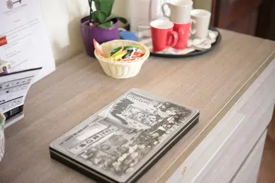 a cell phone sitting on top of a table at Trastevere Dream House in Rome