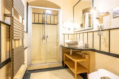 a bathroom with a sink and a shower at Opera Theater Relais in Rome