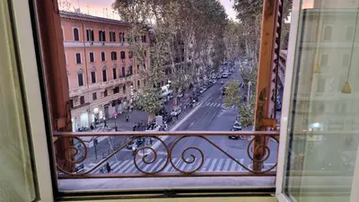 a view of a city street from a window at Rome Aparts - Deluxe Apartment with 3 bedrooms at St Peter square in Rome