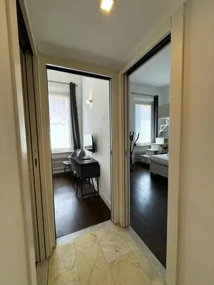 a view of a living room with a piano in a room at Monti Central in Rome