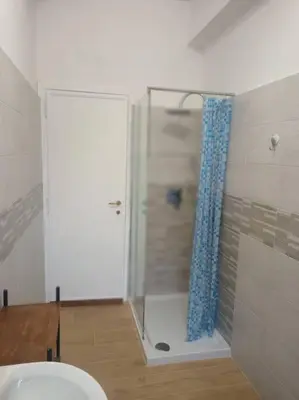 a bathroom with a shower with a toilet in it at da Giò a Trastevere in Rome