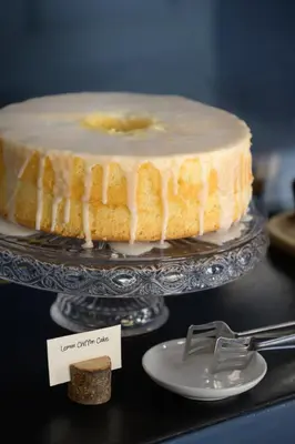 a cake on a glass plate on a table at The Fifteen Keys Hotel in Rome