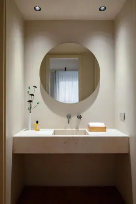 a bathroom with a sink and a mirror at C10 Boutique Hotel in Rome