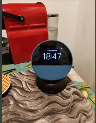 a digital clock sitting on top of a table at Little gem in Trevi Fountain in Rome