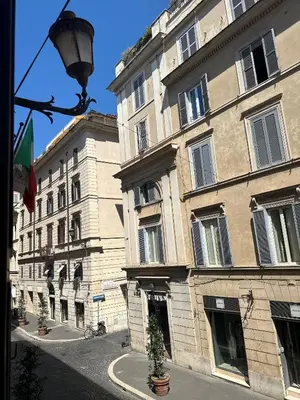 a building with a street light in front of it at My Spanish Steps Apartment - 2 bathrooms in Rome