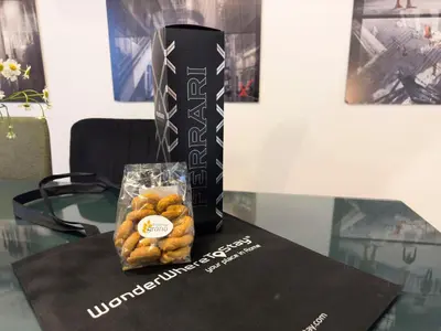a bag of donuts is sitting on a table at Pantheon Terrace 2 BR Apartment in Rome