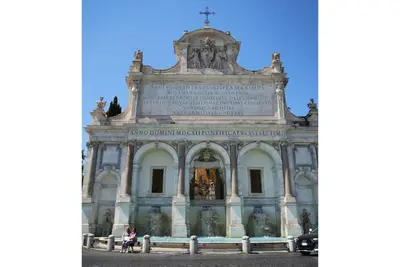 a building in the city of versailles at C&A Apartments - Authentic Trastevere in Rome