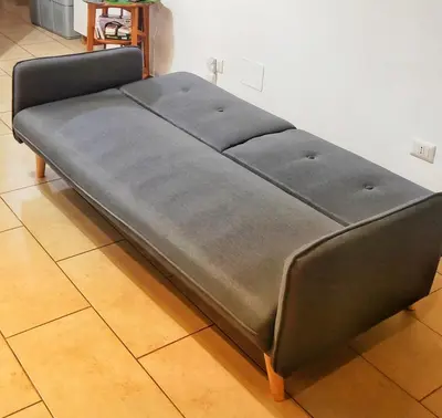 a large bed is sitting in a room at C&A Apartments - Authentic Trastevere in Rome